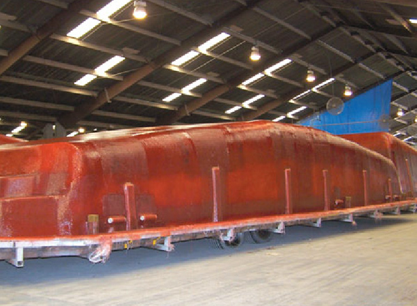 Upside view of the mold of a fiberglass pool shell