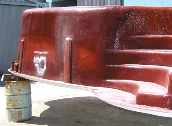 Upside view of the mold of a fiberglass pool shell